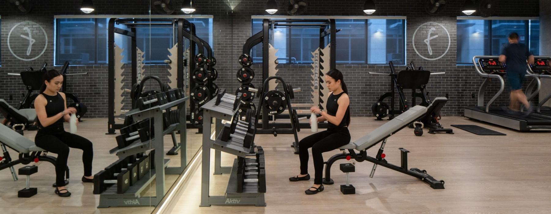 a group of people working out in a gym