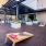 Outdoor lounge with cornhole
