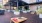 Outdoor lounge with cornhole