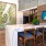 Seating at counter in lobby with TV on Wall