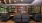conference table with seating and a bookshelve with books