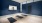 Yoga room with mats on floor and large TV