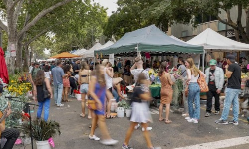 a group of people dancing in a street